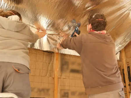 Mise en place des isolations de la toiture